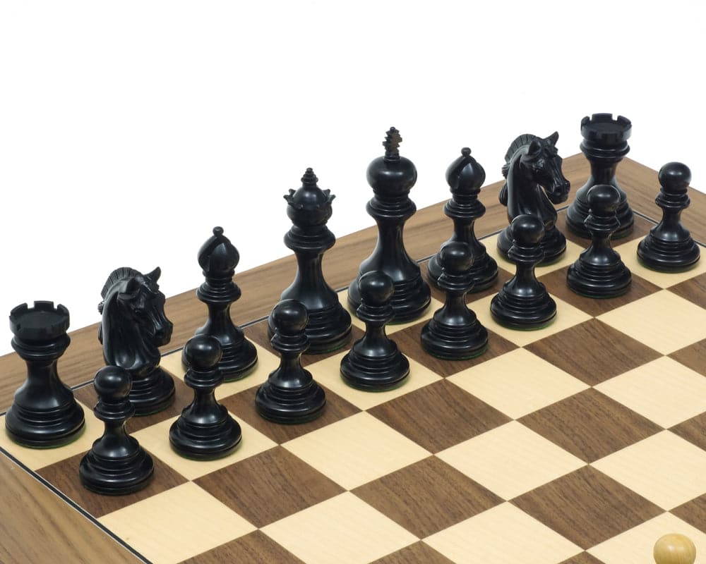 The Garvi Ebony and Walnut Luxury Chess Set featuring ornate Staunton design chess pieces on a 19-inch Spanish board.