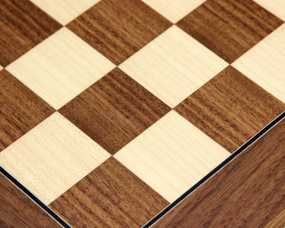 Close-up of 15.75 inch walnut and maple deluxe chess board with 1.58 inch playing squares, handcrafted by Rechapados Ferrer of Spain.