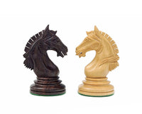 The Garvi 4 inch Rosewood Chessmen Knights crafted from solid rosewood and boxwood, inspired by 16th century Indian history, with billiard cloth bases.