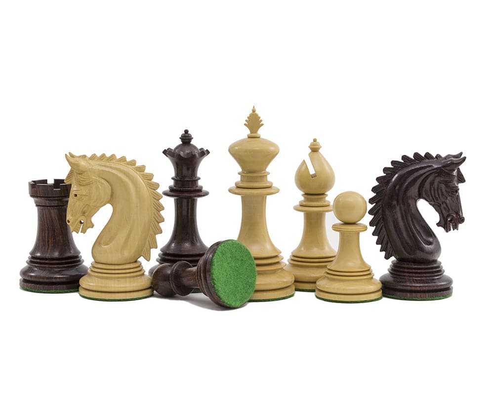 The Lemington Rosewood Chessmen 4.25 inch set with handcrafted ornate detail, rosewood knights, 4.25 inch king, weighted pieces on billiard cloth bases