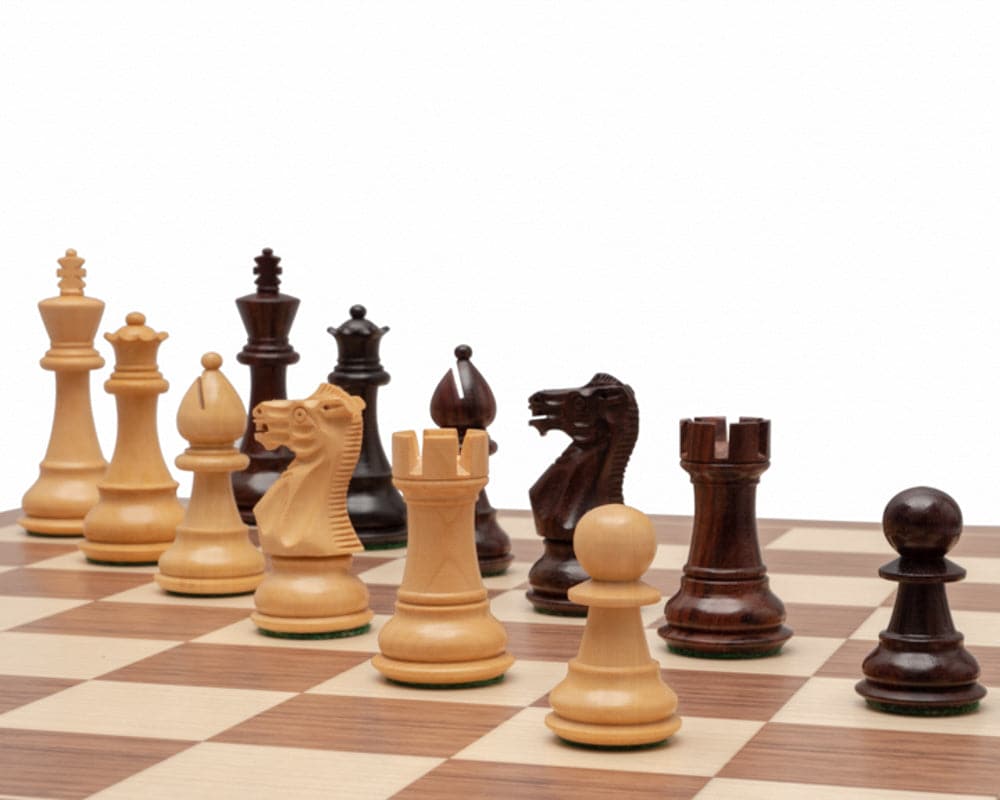 Classic Staunton Rosewood chessmen on a chessboard, featuring expertly turned and weighted chess pieces with 3.5 inch king and additional queens.