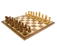 Down Head Knight Academy Medium Chess Set with Staunton chess pieces on a walnut board.