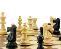 French Knight ebonised classic chess set with Staunton pieces on a walnut board showcasing detail and quality.