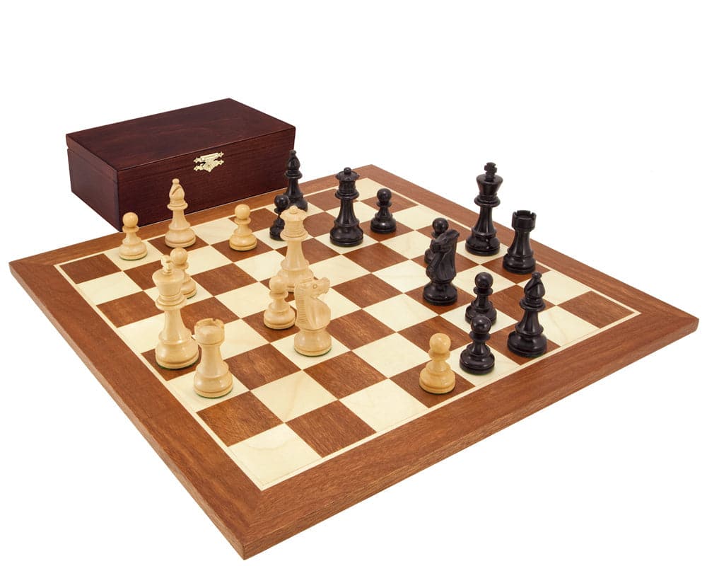 French Knight Black Mahogany Chess Set with handcrafted chessmen on mahogany and maple board, solid birchwood case in the background.