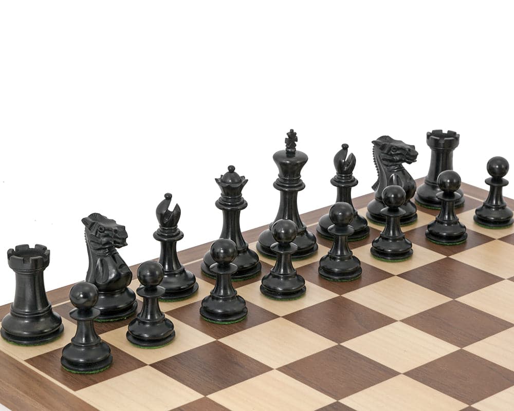 Competition compact Staunton walnut chess set with ebonised chessmen and 3 inch king on walnut and maple board.