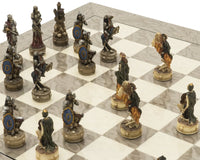 The Zombie and Grey Ash Deluxe Chess Set featuring intricately detailed resin pieces and a glossy grey ash burl board