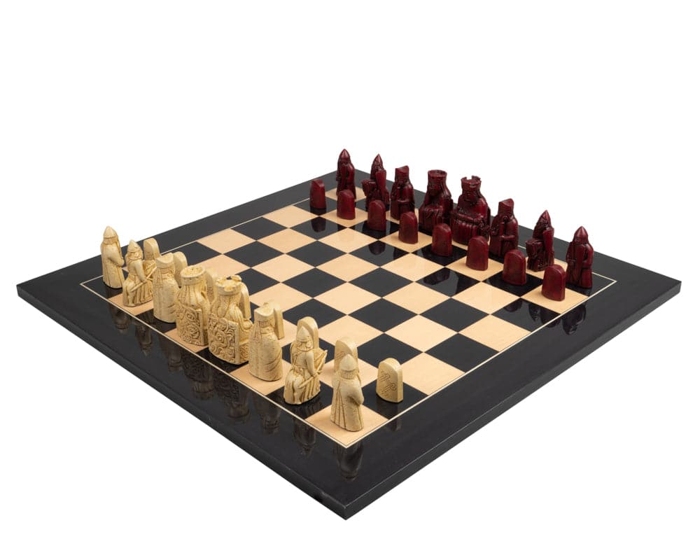 The Isle of Lewis Black and Red Chess Set with 3.25 inch king pieces and additional Queens in superb gift packaging.