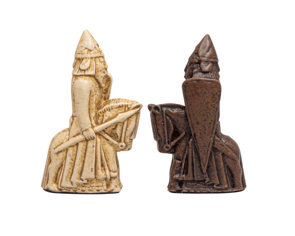 Detailed Isle of Lewis chess pieces made by Italian craftsmen in white and brown.