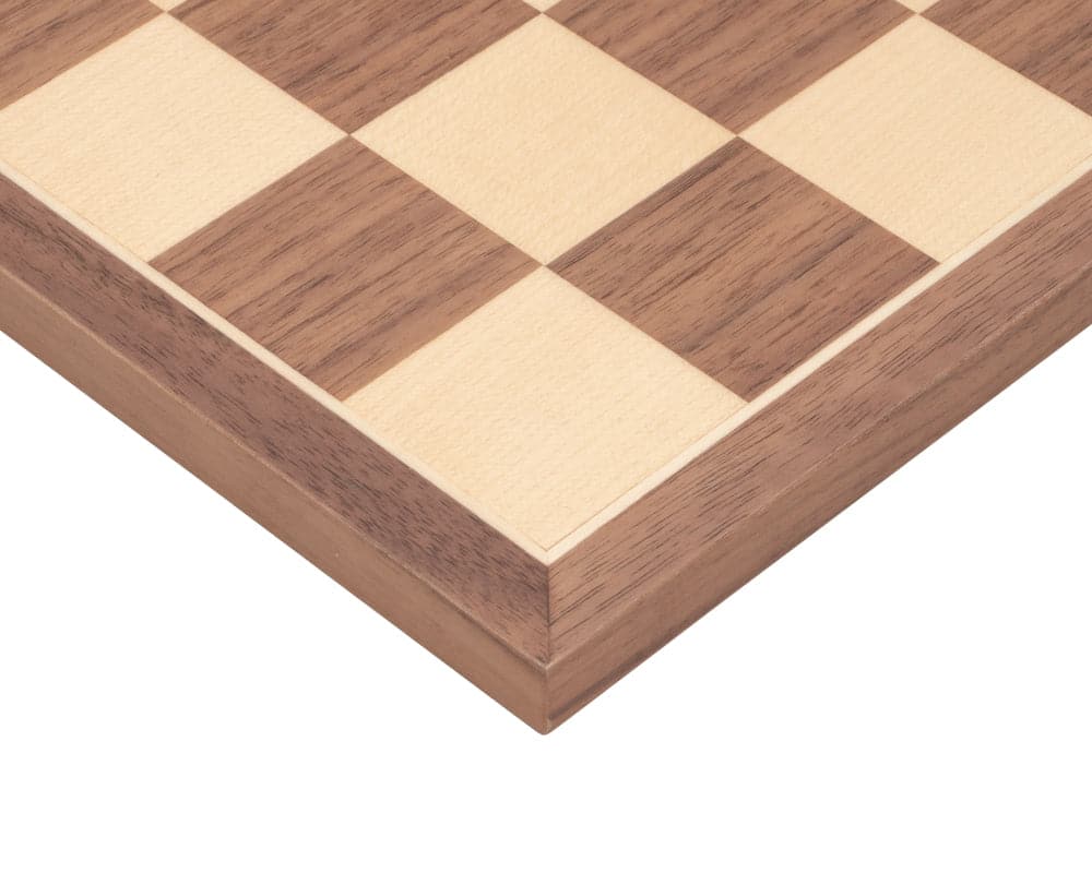 Close-up of high quality Walnut and Maple chessboard with 1.5 inch playing squares in a traditional chess and draughts set.